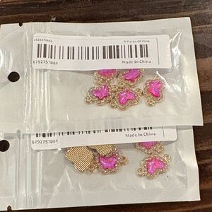 Butterfly charms pink.